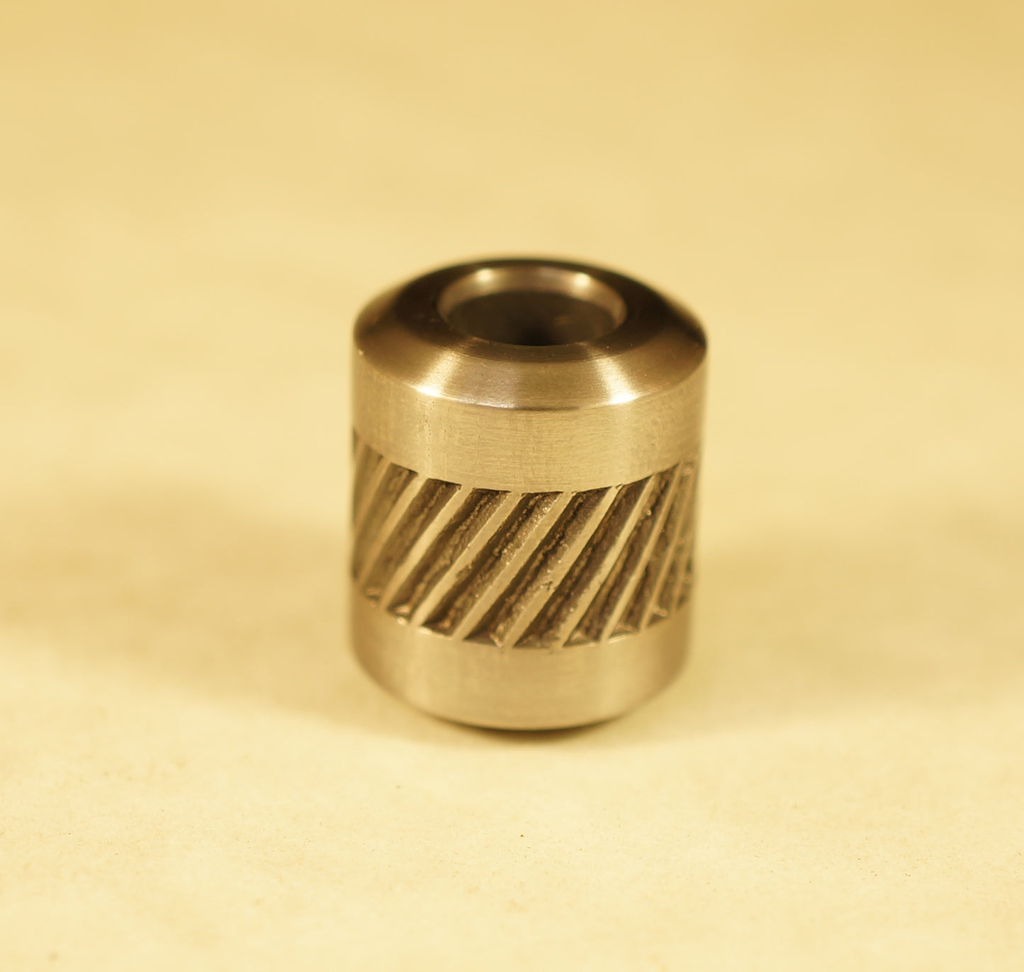 Bead #82	.53"x.61"		Titanium Gr5 , Knocked Down Rifle Knurled Stripe